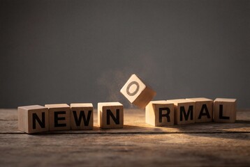 Wooden blocks spelling new normal on table with flipping letter o indicating change and adaptation