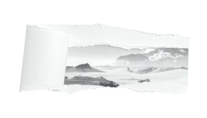 Torn paper revealing a monochrome landscape with misty mountains