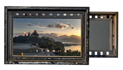 Aged frames showcase scenic landscape; sunset, mountains, and lake