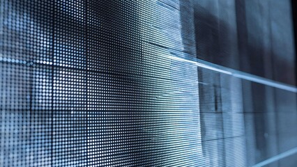 Futuristic digital LED screen display with abstract electronic grid pattern