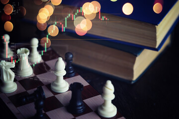 Chess game with black and white wooden chips on wooden board. At sunset. Realistic.