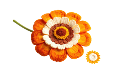 Crochet flower, vibrant colors, on black. Smaller matching flower present