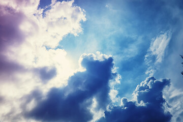 High clouds in the summer sky. Sky background. Meteorological observations of the sky.