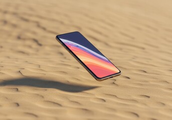 Smartphone with Colorful Display Lying on Sandy Desert Surface Under Natural Sunlight