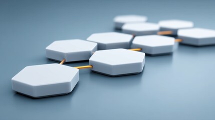 Abstract representation of connected hexagonal shapes with orange links on a smooth blue surface showcasing geometric design and modern aesthetics