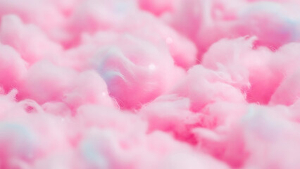 Close-up macro shot of fluffy pink cotton candy with a soft focus background