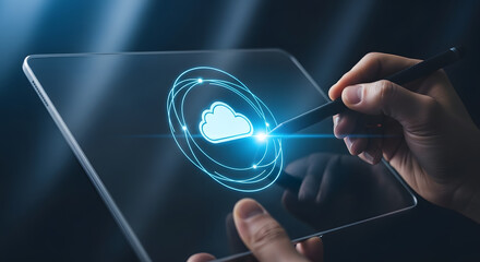 User interacting with stylus pen on transparent tablet displaying cloud computing storage connection icon
