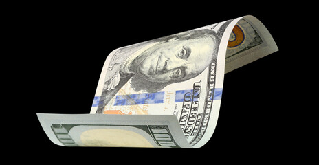 Curved hundred dollar banknote, isolated on black background