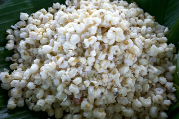 Nasi Jagung, Corn rice, an Indonesian traditional food made from corn as the basic ingredient on green banana leaves