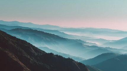 Fototapeta premium Minimal mountain landscape panorama with foggy atmosphere, soft sunrise light, muted natural colors, tranquil composition, wide framing with copy space