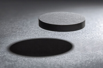 Elongated oval shadow from flat circular object, minimalist visual distortion concept layout