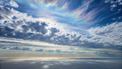 Fototapeta premium Expansive skyline interpretation. vast celestial vista with drifting clouds and colorful sky over calm ocean