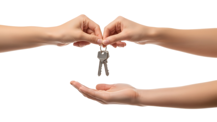 Hands exchanging keys in a symbolic gesture of transfer or agreement