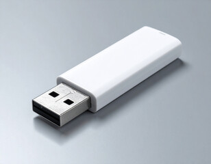 White USB flash drive with metallic connector on a textured gray studio background storage