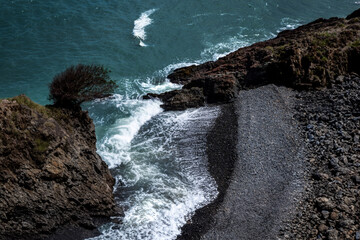 waves crashing on rocks