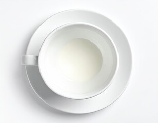 Empty white cup and saucer, top-down view, soft shadows