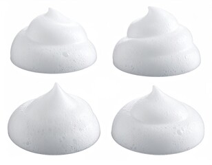 Four fluffy, white, pearly mounds of creamy foam