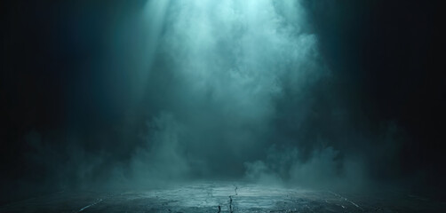 Empty stage with dramatic teal spotlights piercing through thick clouds of smoke. Moody atmosphere on concrete floor. Light rays cut through haze. Dark background.