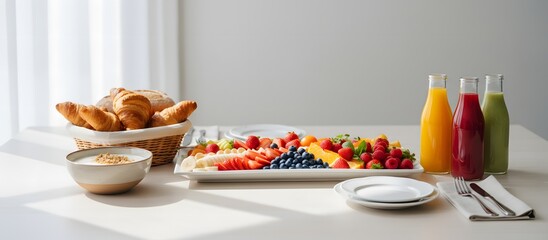 Wide Healthy Breakfast Spread with Fresh Fruits and Pastries