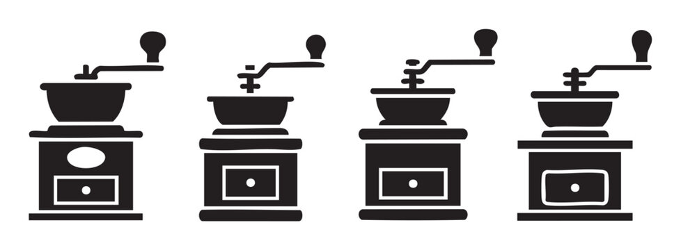 Four manual coffee grinders are displayed in a row, showcasing different classic designs of these essential kitchen tools for brewing fresh, aromatic beverages.