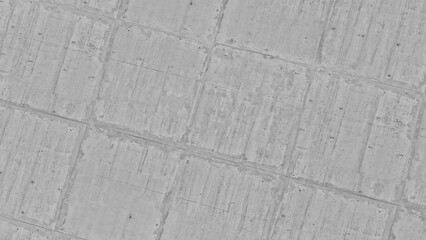 Aerial view of agricultural field patterns, suggesting rural land use and cultivation from above