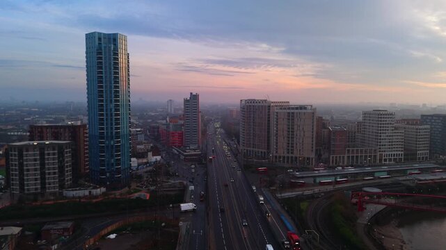 Wide angle aerial view A13 road through urban London with modern skyscrapers