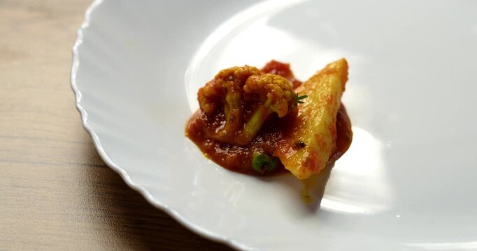 aloo gobhi Mix Vegetable greavy recipe in a bowl, Indian restaurant style veg recipe served with Chapati