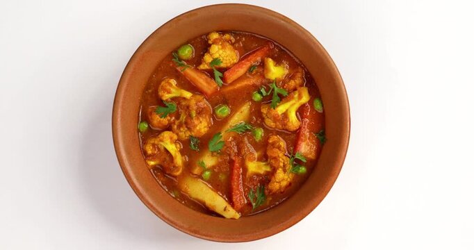 aloo gobhi Mix Vegetable greavy recipe in a bowl, Indian restaurant style veg recipe served with Chapati