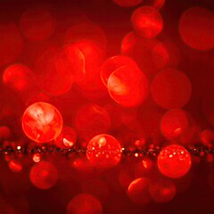 Bright red bokeh with shimmering orbs and a reflective surface