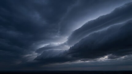 Obraz premium Dramatic Dark Storm Clouds Forming a Shelf Cloud Before Thunderstorm