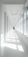 All-white hallway filled with light and dark shadows