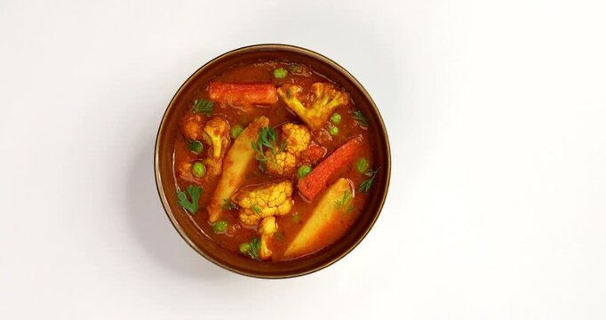 aloo gobhi Mix Vegetable greavy recipe in a bowl, Indian restaurant style veg recipe served with Chapati