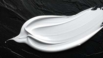 White Cream Swipe on Dark Textured Surface with Glossy Finish and Visible Brush Marks