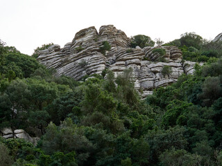 Karst landscape. It is a limestone relief that emerged from the sea, with whimsical formations, limestone pavements and towers. Canuto de la Utrera, Malaga, Andalucia, Spain. 