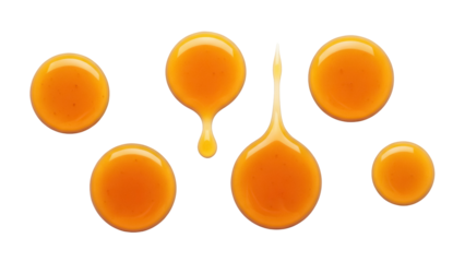 Golden honey drops isolated PNG, sweet liquid blobs on transparent background for food design and healthy lifestyle concepts