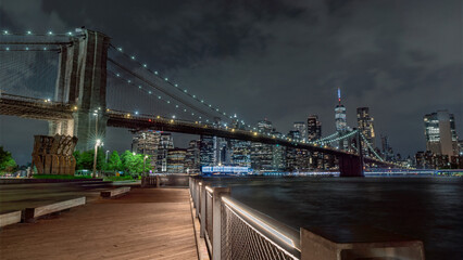 Brooklyn Bridge and Lower Manhattan skyline at dawn, New York City, New York, United States of America, USA