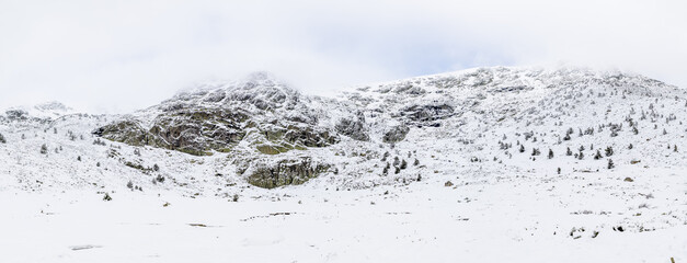 The Sierra de Guadarrama mountains in Madrid during the snowfall of december 2025, at the Cotos mountain pass