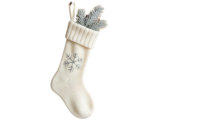 White knitted Christmas stocking with snowflake and pine sprigs image