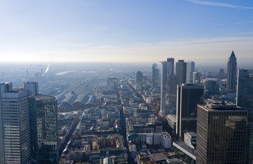 Obraz premium Aerial view from viewing platform of Main Tower platform with skyline and blue sky background on a sunny autumn day. Photo taken November 22nd, 2025, Frankfurt am Main, Germany.