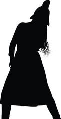Silhouette of a woman with long hair wearing a coat, standing against a bright background with wind blowing her hair.
