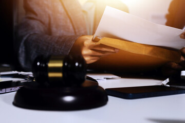 Businesswoman and Male lawyer or judge consult and conference having team meeting with client at law firm in office, Law and Legal services concept