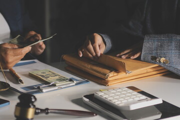 Businesswoman and Male lawyer or judge consult and conference having team meeting with client at law firm in office, Law and Legal services concept