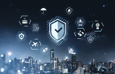 Futuristic digital protection concept with insurance and security hologram icons floating above a modern city skyline at night.