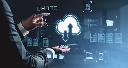 Businessman interacts with holographic cloud storage interface on futuristic digital screen in modern office environment conceptually illustrating data upload.