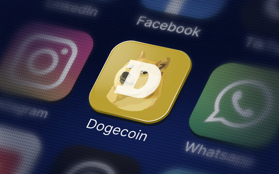 Dogecoin Crypto logo on the smartphone