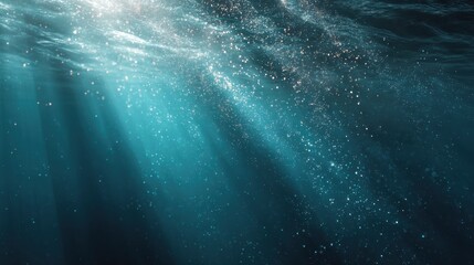 Sunlight filtering through ocean water with bubbles rising
