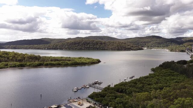 UP from Mooney Mooney village waaterfront to Hawkesbury river bridges in Australia.