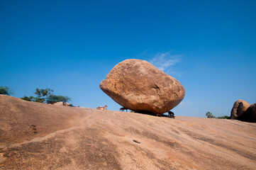 Krishnas butterball, Balancing giant natural rock stone, Mahabalipuram, Tamil Nadu, India