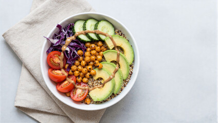 Healthy Vegan Buddha Bowl with Quinoa and Roasted Chickpeas on Linen