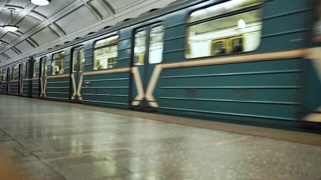 Moscow Metro Belorusskaya station platform with marble wall and signal light